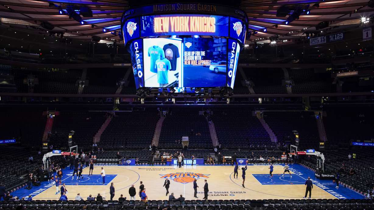 New York Knicks players and Indiana Pacers players warm up before a preseason NBA basketball game, Friday, Oct. 7, 2022, in New York.