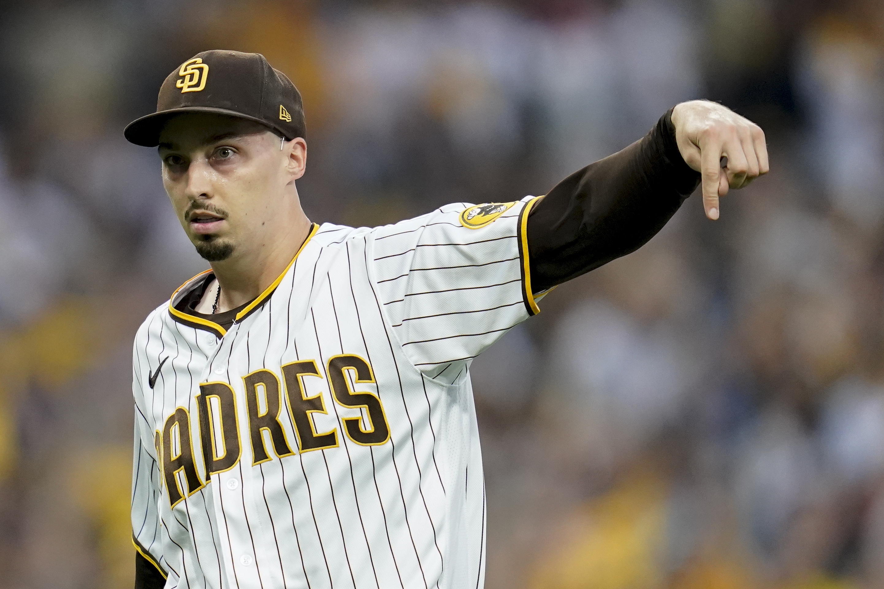 San Diego Padres starting pitcher Blake Snell reacts after striking out Los Angeles Dodgers' Will Smith during the first inning in Game 3 of a baseball NL Division Series, Friday, Oct. 14, 2022, in San Diego.