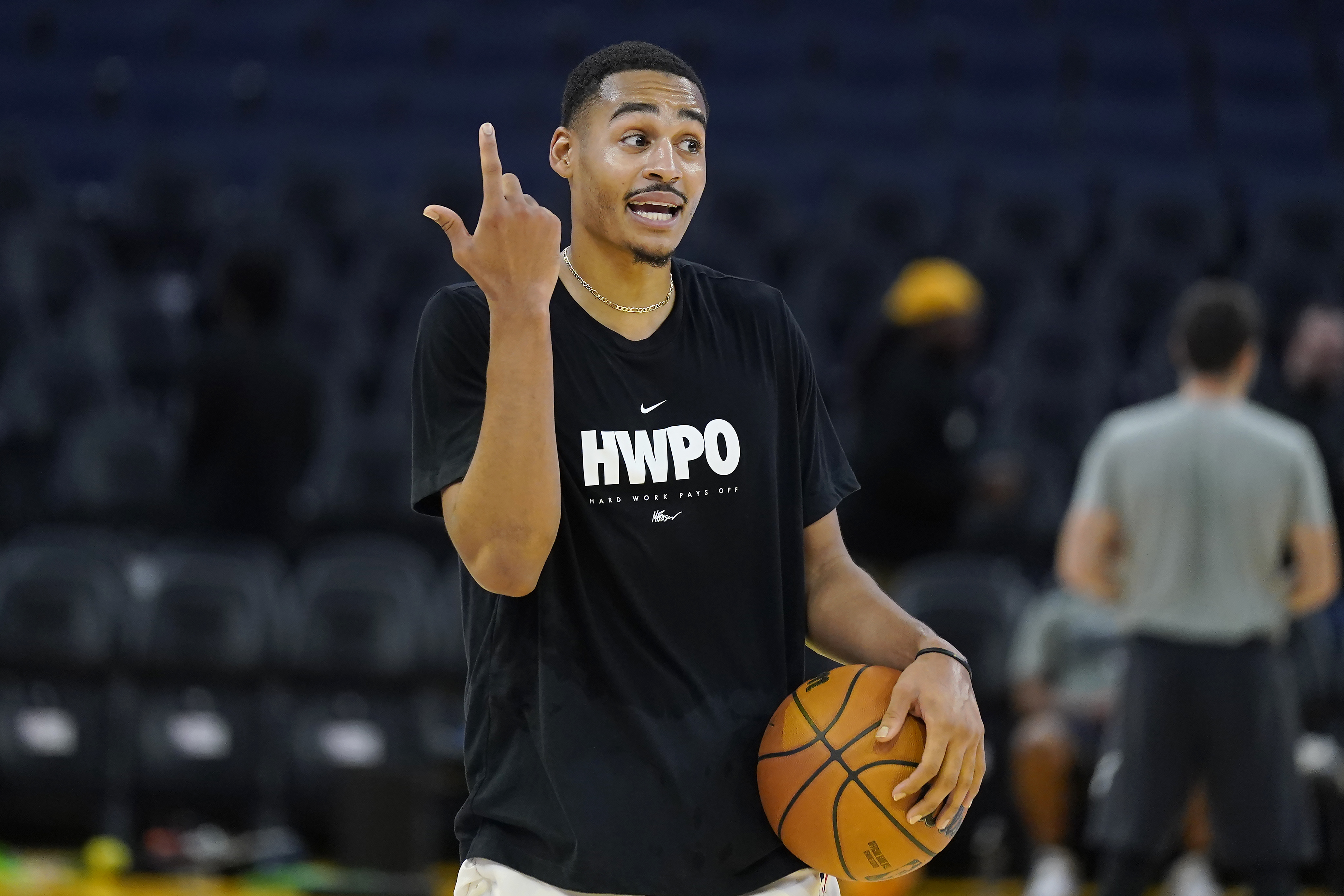 Golden State Warriors guard Jordan Poole warms up before an NBA preseason basketball game against the Denver Nuggets in San Francisco, Friday, Oct. 14, 2022.