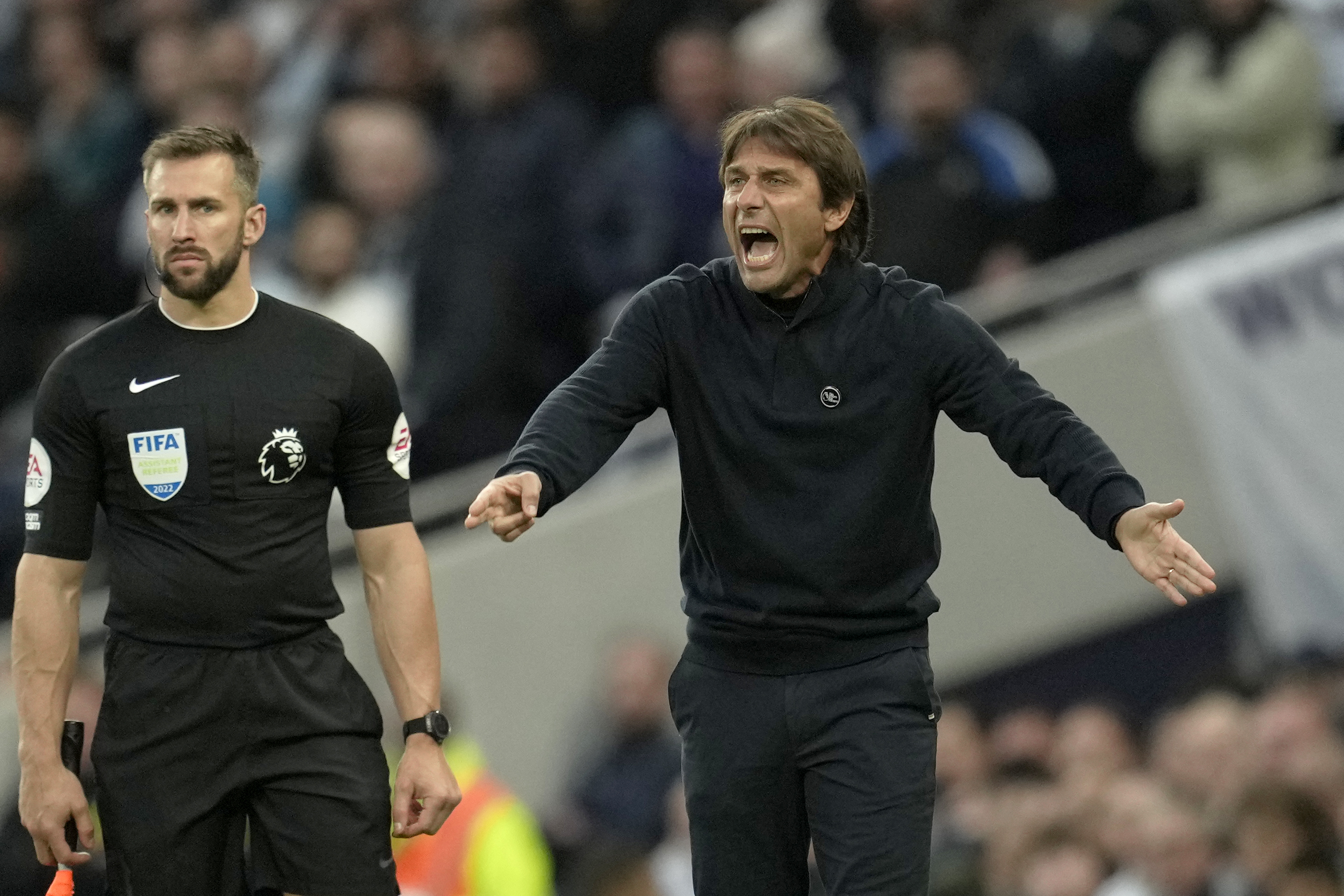 Tottenham's head coach Antonio Conte gestures during the English Premier League soccer match between Tottenham Hotspur and Everton at the Tottenham Hotspur Stadium in London, England, Saturday, Oct. 15, 2022. 