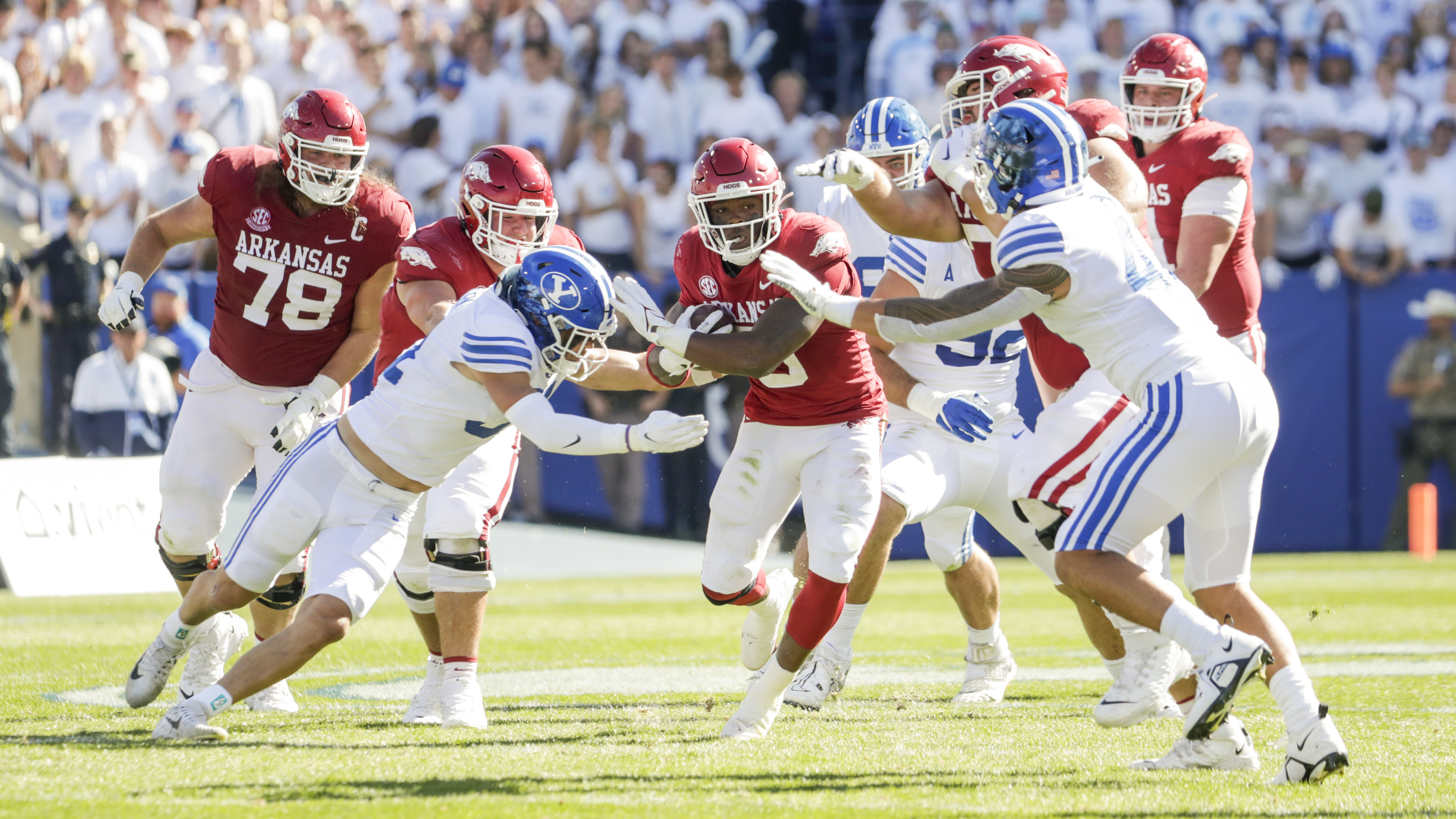 Sanders Raheim (5) a running back for the Arkansas Razorbacks runs the ball while playing the BYU Cougars in Provo on Saturday, Oct. 15, 2022.