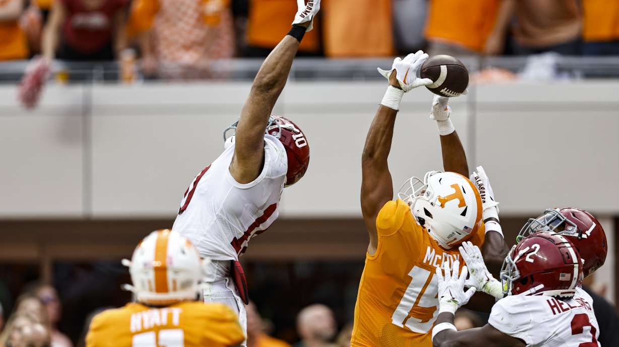 Tennessee wide receiver Bru McCoy (15) tries to catch a Hail Mary pass during the first half of an NCAA college football game against Alabama Saturday, Oct. 15, 2022, in Knoxville, Tenn.