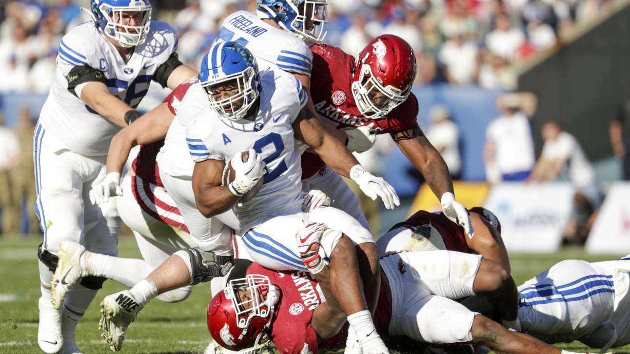 BYU running back Christopher Brooks (2) turns upfield during a run against the Arkansas Razorbacks, Saturday, Oct. 15, 2022 at LaVell Edwards Stadium in Provo.