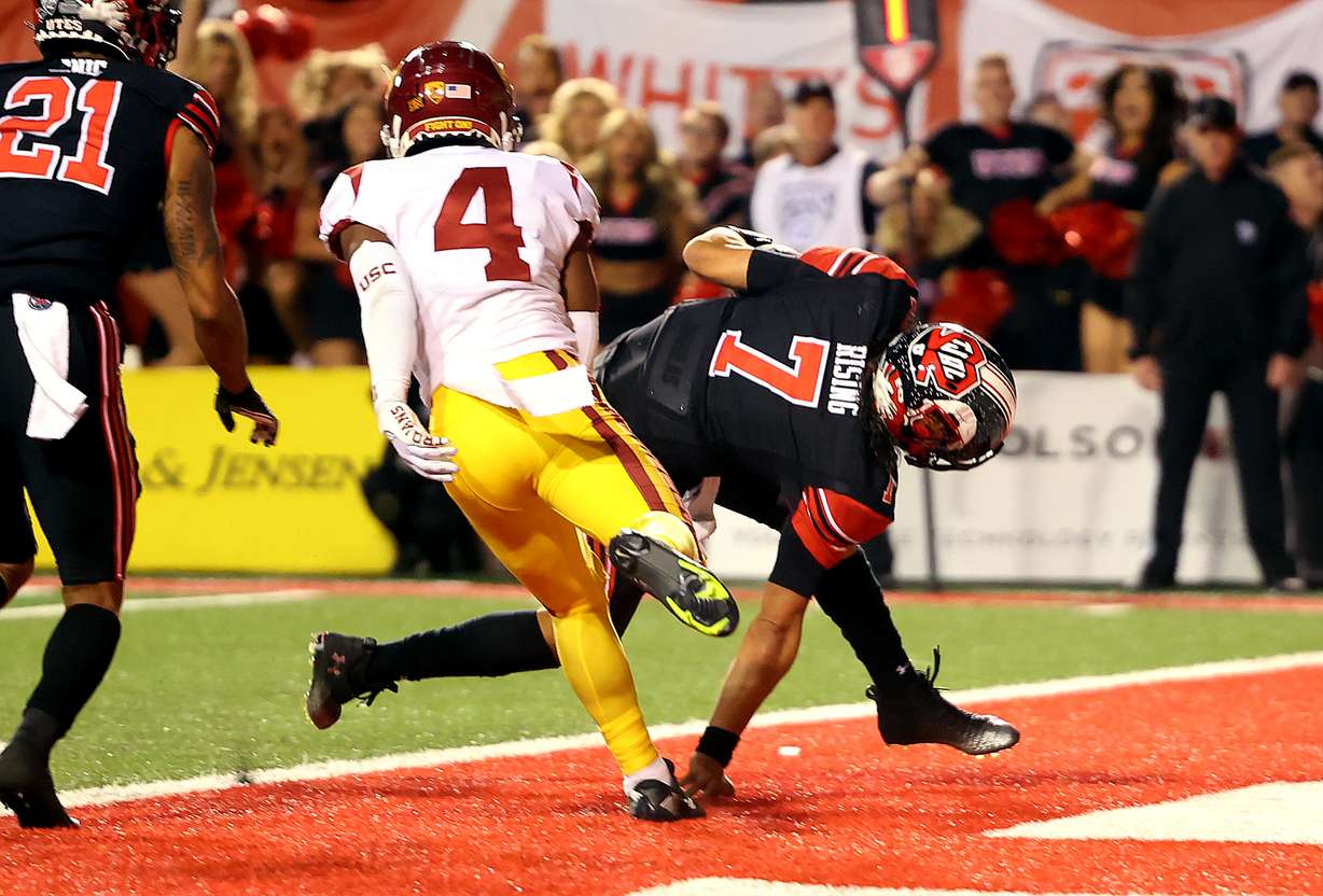 Utah Utes quarterback Cameron Rising (7) takes the ball in for a two point conversion giving Utah the lead as they and USC play at Rice Eccles Stadium in Salt Lake City on Saturday, Oct. 15, 2022. Utah won 43-42.