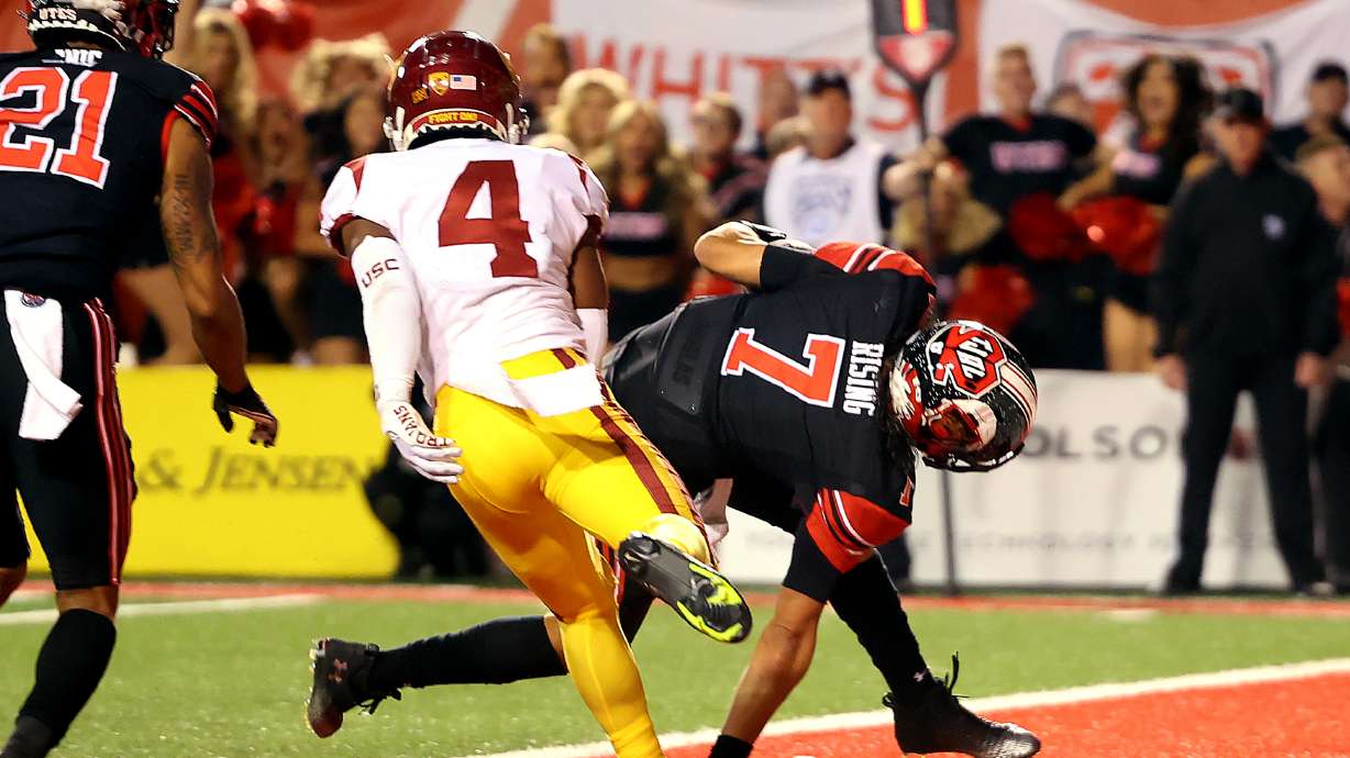 Utah Utes quarterback Cameron Rising (7) takes the ball in for a two point conversion giving Utah the lead as they and USC play at Rice Eccles Stadium in Salt Lake City on Saturday, Oct. 15, 2022. Utah won 43-42.