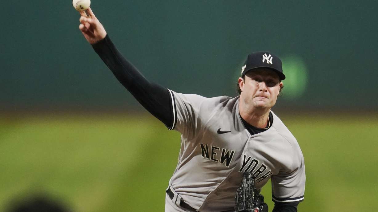 New York Yankees' Gerrit Cole pitches in the first inning of Game 4 of a baseball AL Division Series against the Cleveland Guardians, Sunday, Oct. 16, 2022, in Cleveland.
