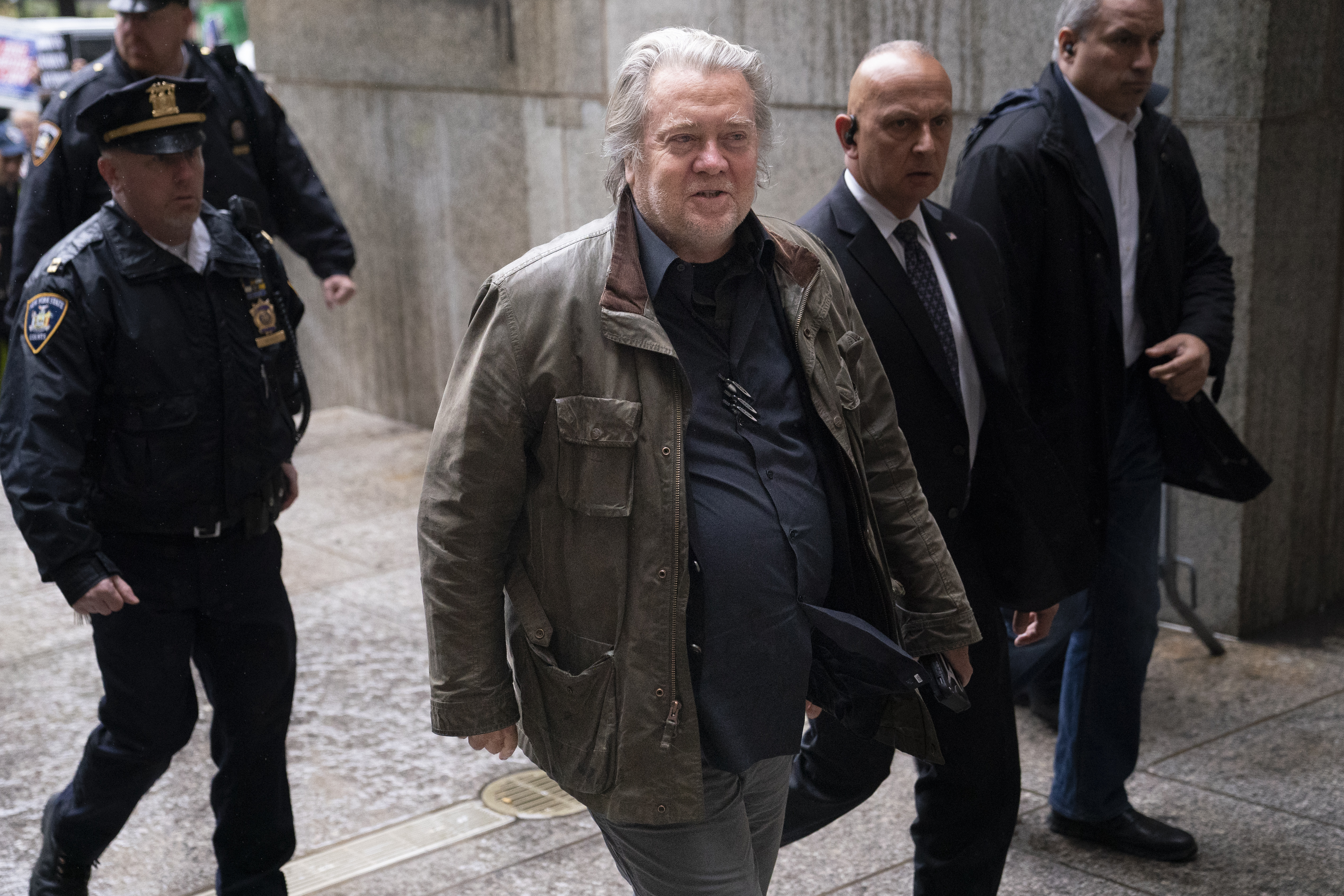 Former White House strategist Steve Bannon arrives at court Oct. 4, in New York. The Justice Department said Monday Bannon should serve six months in prison and pay a $200,000 fine for defying a subpoena from the House committee investigating the Jan. 6 insurrection at the U.S. Capitol.