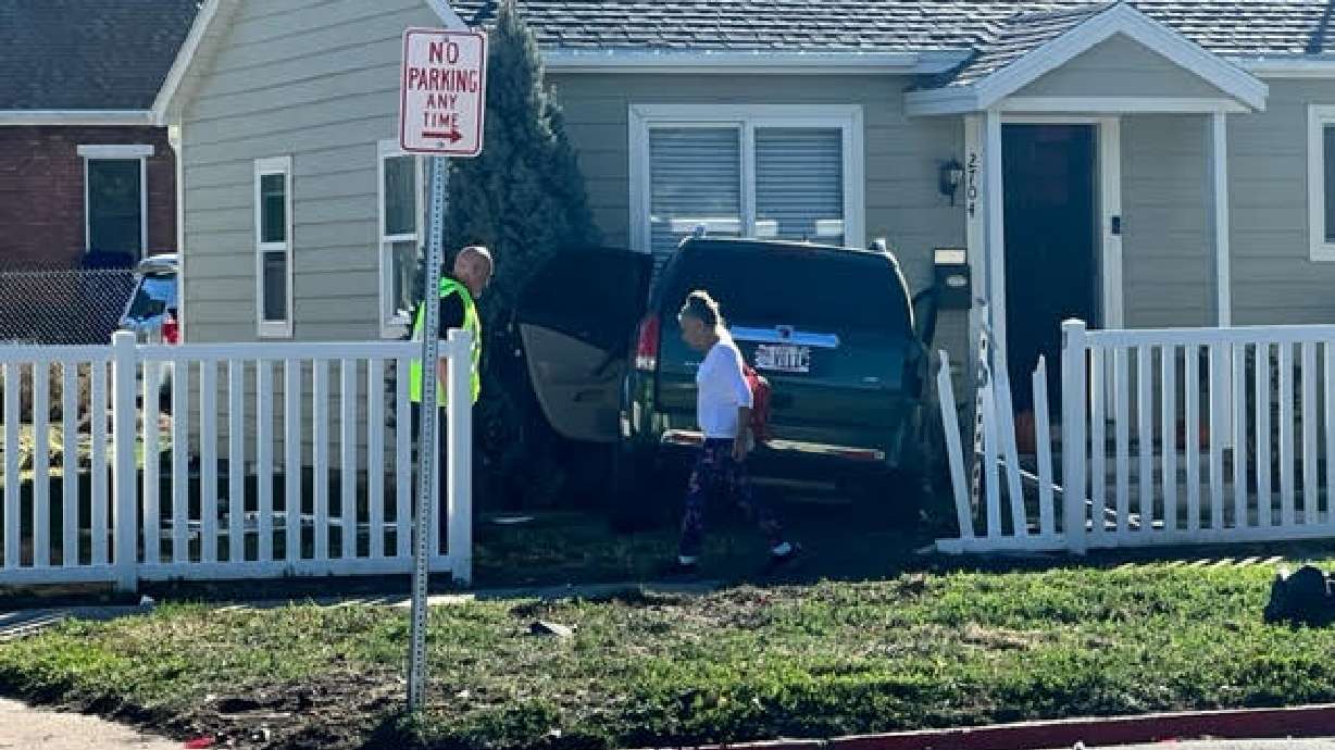 A motor vehicle crash on the corner of 27th Street and Monroe Boulevard Monday led to minor injuries and a car crashing into a home.