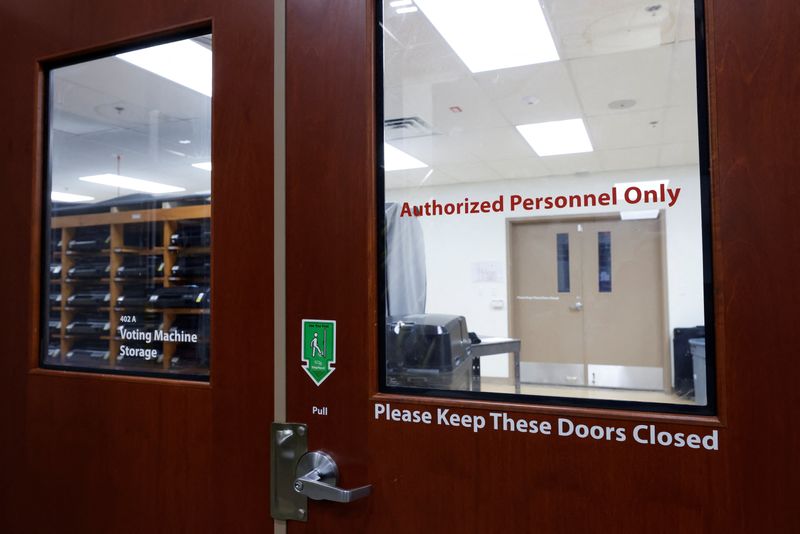 Voting ballot scanners are stored in a secure room amid heightened security measures ahead of the midterm elections at the Leon County Supervisor of Elections office in Tallahassee, Fla., Oct. 5.