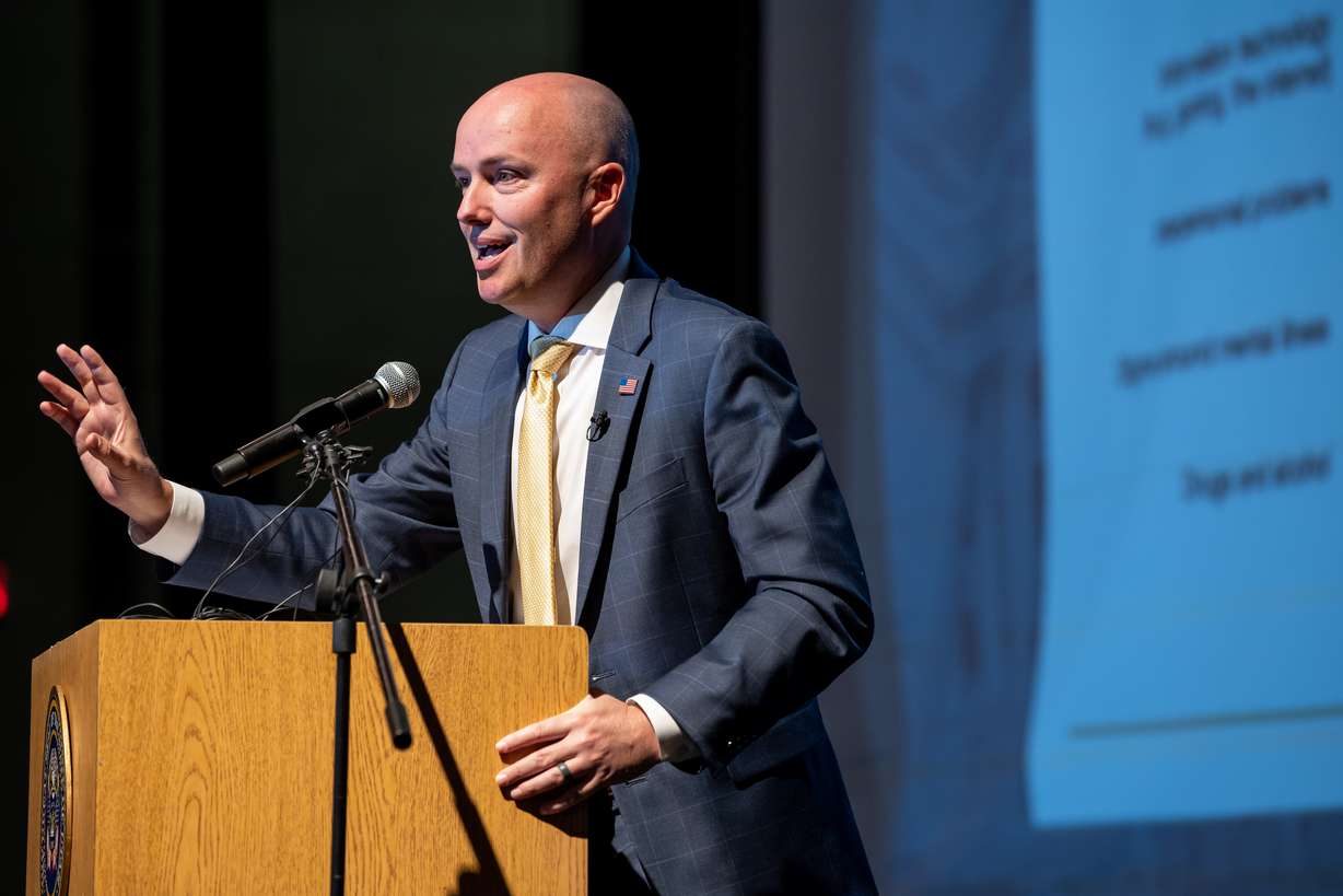 Gov. Spencer Cox speaks to a group of teachers and parents about the effects of social media on teens’ mental health at Bonneville Jr. High School, in Holladay, on Monday. Cox said he believes social media is negatively impacting the mental health, social connection and emotional well-being of Utah teens.