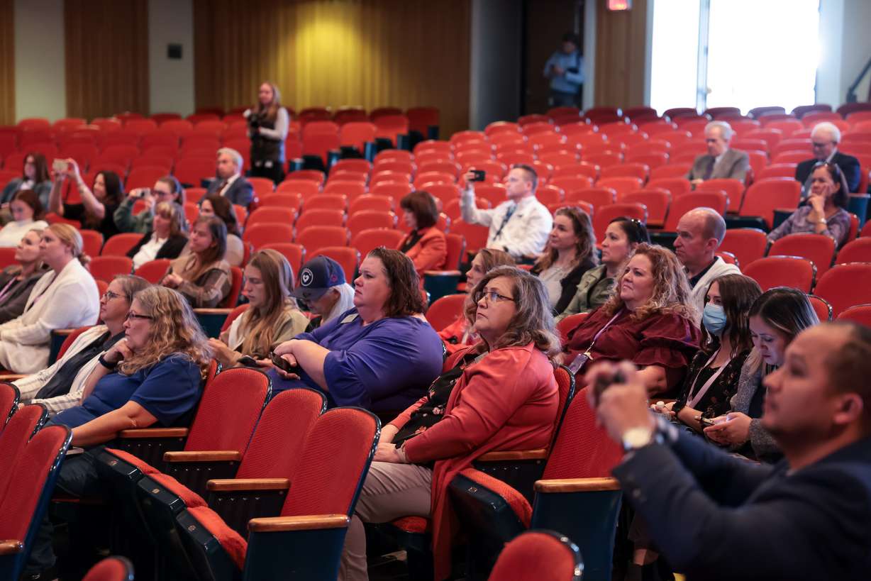 A group of teachers and parents listen to Gov. Spencer Cox talk about the effects of social media on teens’ mental health at Bonneville Jr. High School, in Holladay, on Monday. Cox said he believes social media is negatively impacting the mental health, social connection and emotional well-being of Utah teens.