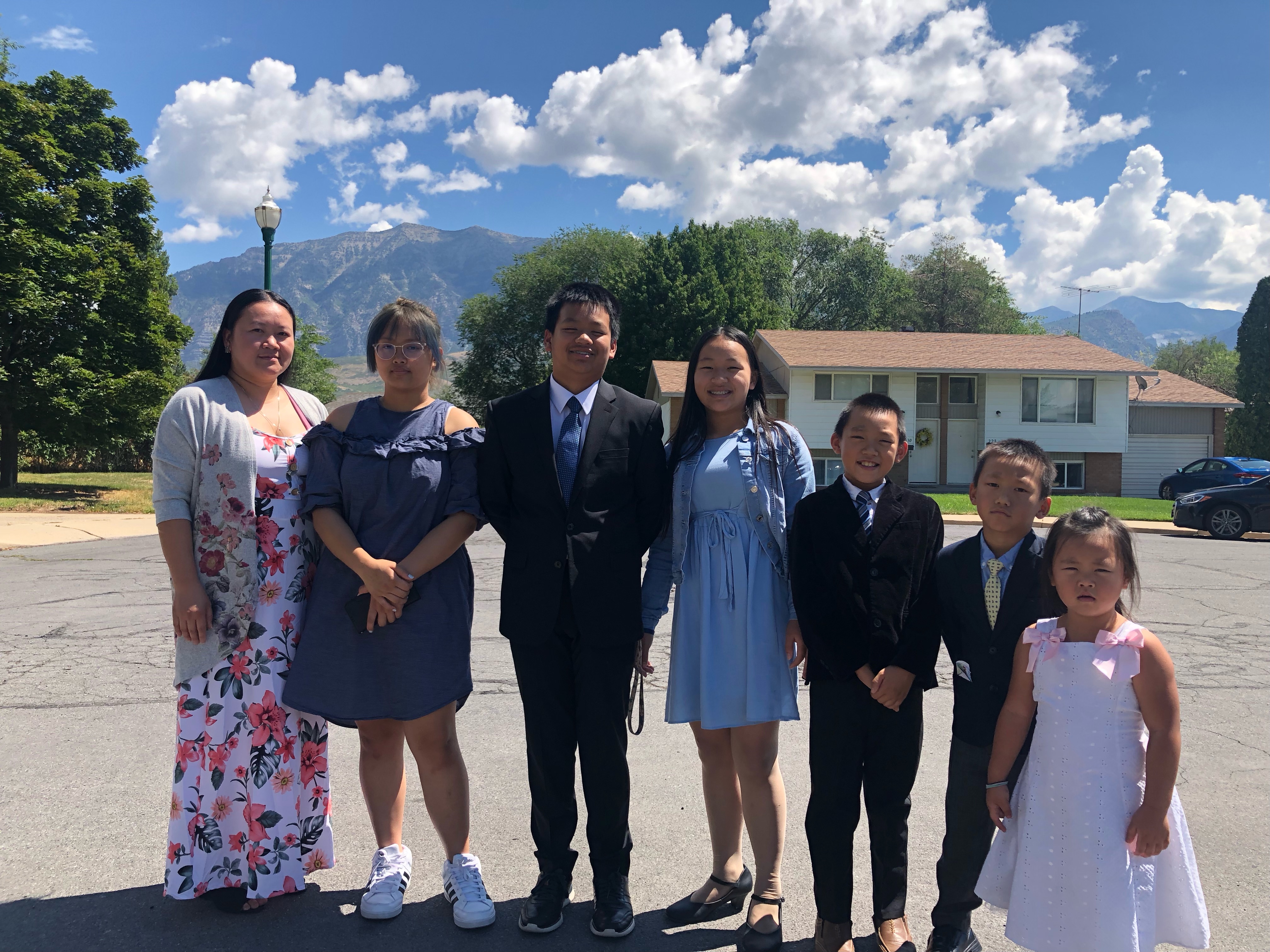 BYU masters student Yang Vang and his family pose for a photograph. Vang is a world-renowned Hmong shaman and his children are members of The Church of Jesus Christ of Latter-day Saints.