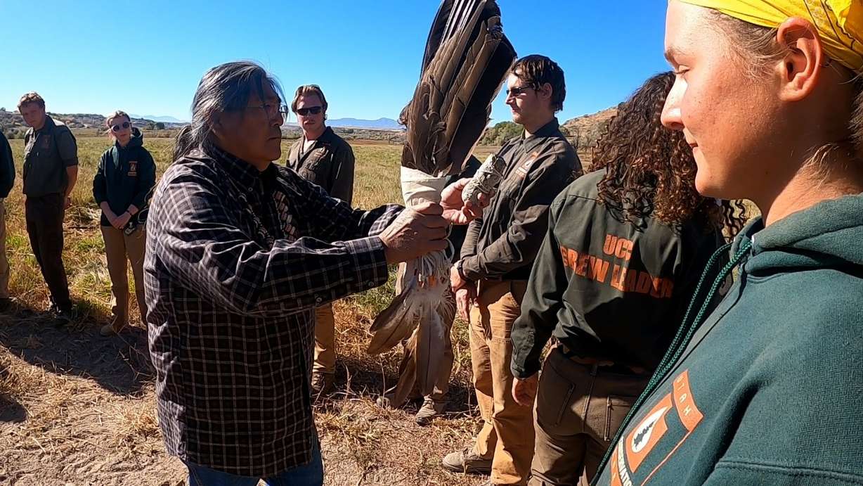 An Indigenous tribe elder blessing the workers at the Bear River Massacre Site on Monday.