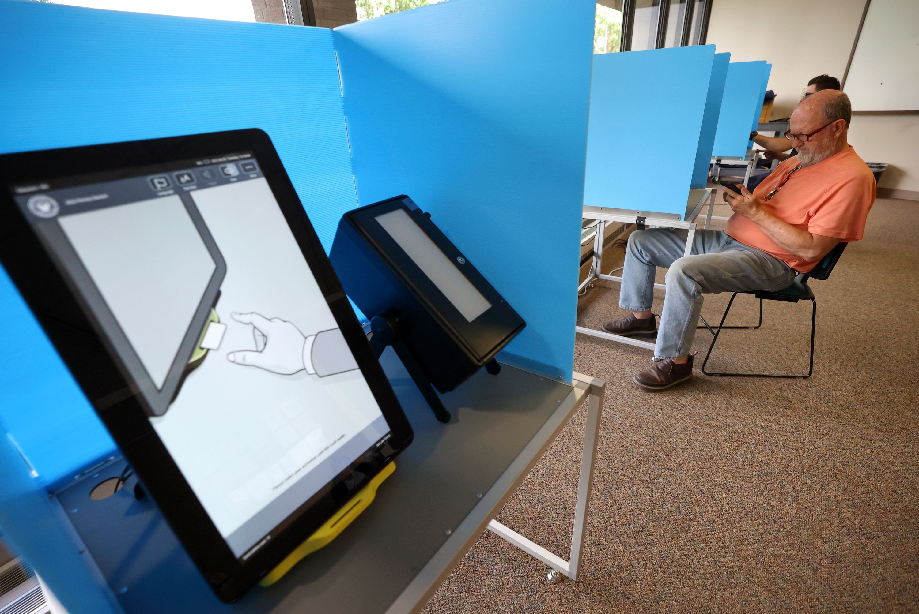 Jay Larsen votes at the Salt Lake County Government Center in Salt Lake City on June 28.