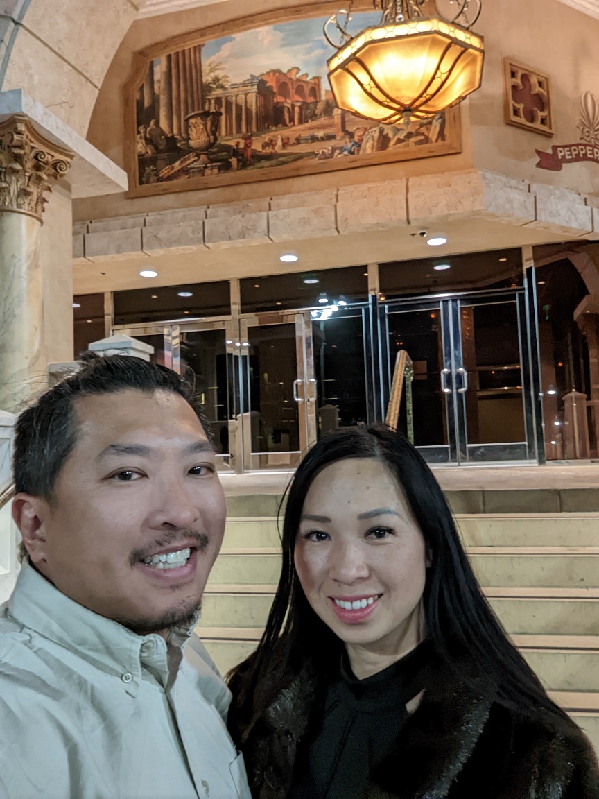 Tammy Luu, right, and her husband, Danh Luu, pose for a photo in front of Peppermill Casino in Wendover.