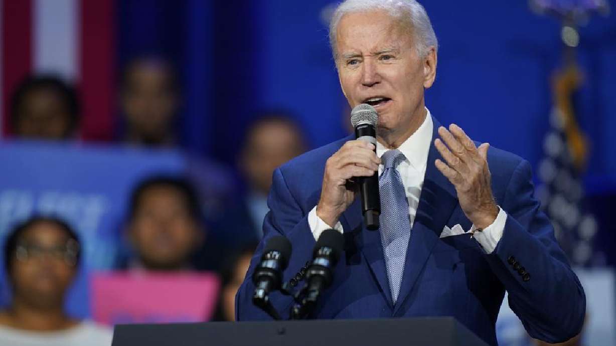 President Joe Biden speaks about abortion access during a Democratic National Committee event, Tuesday, at the Howard Theatre in Washington. Biden, under renewed pressure over high inflation with mid-term elections approaching, said on Tuesday he will sign a law to codify abortion rights in January if Democrats control the legislature next year.