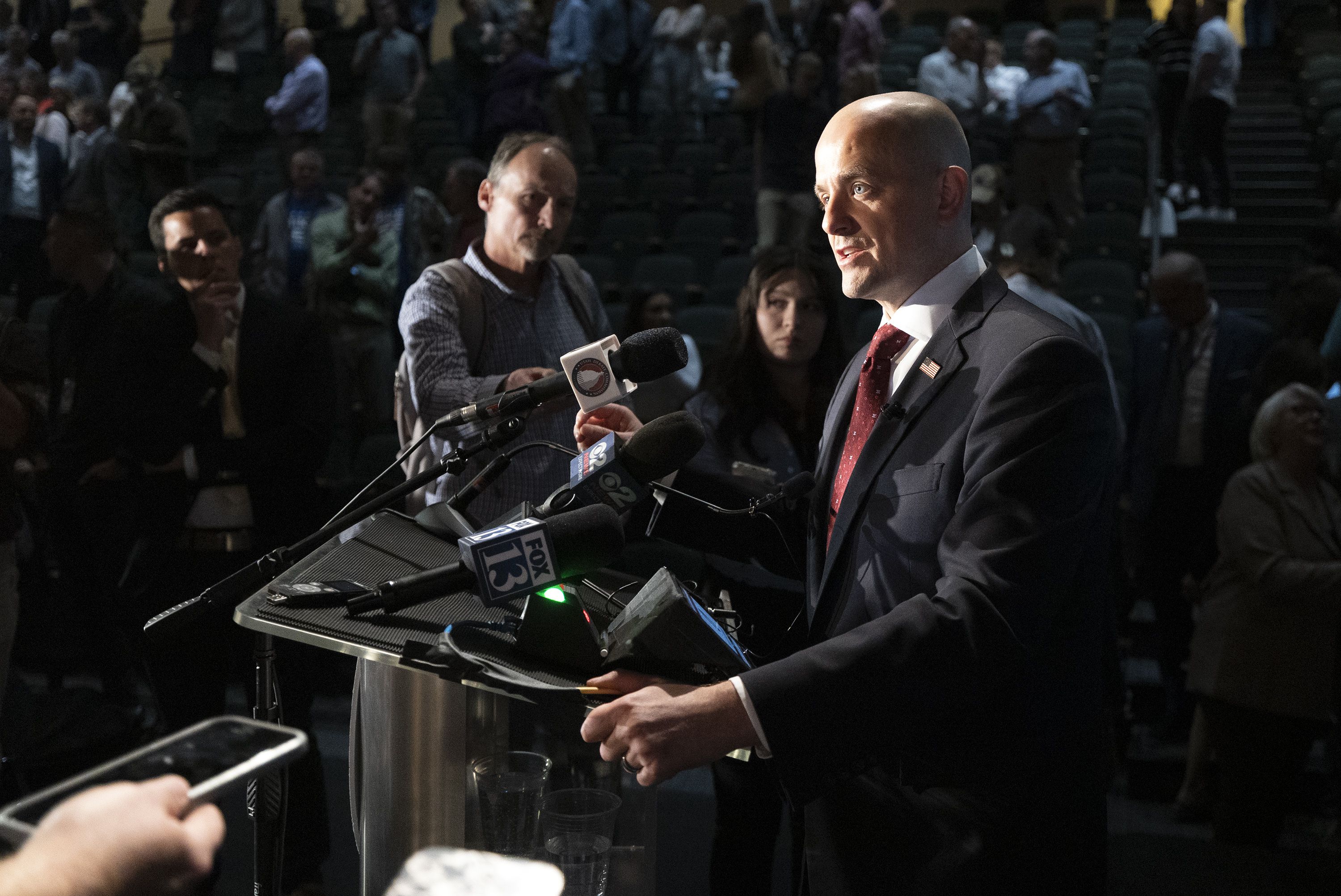 Evan McMullin talks with members of the media following a debate with Sen. Mike Lee, R-Utah, at Utah Valley University in Orem on Monday.