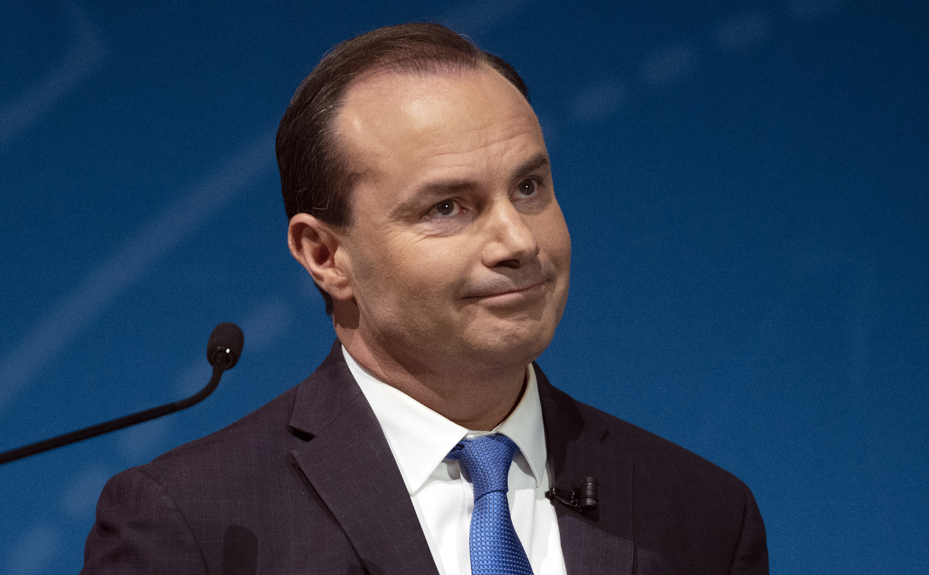 Sen. Mike Lee, R-Utah, reacts to a statement from Evan McMullin as they debate at UVU in Orem on Monday.