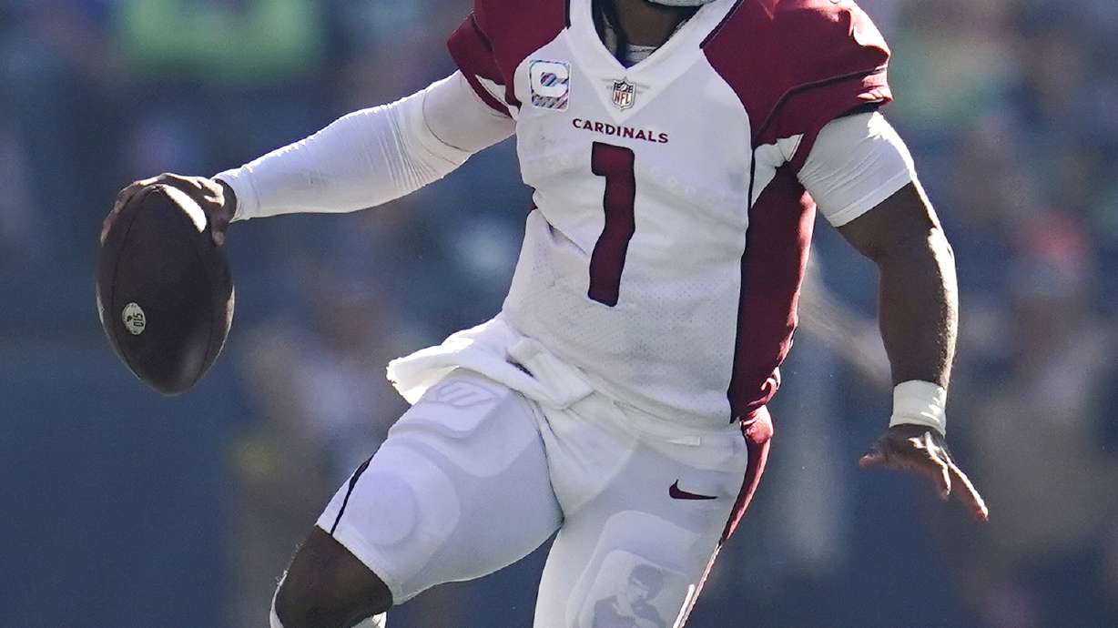 Arizona Cardinals quarterback Kyler Murray (1) runs with the ball during the second half of an NFL football game against the Seattle Seahawks, Sunday, Oct. 16, 2022, in Seattle.