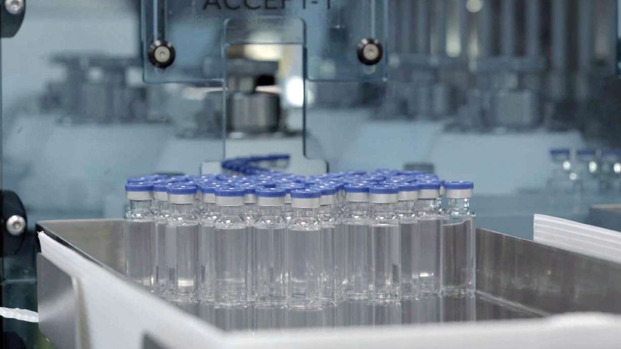 Vials of freshly manufactured Novavax COVID-19 vaccines wait to be labeled in Pune, India. On Wednesday, U.S. regulators authorized a booster dose of the COVID-19 vaccine made by Novavax.