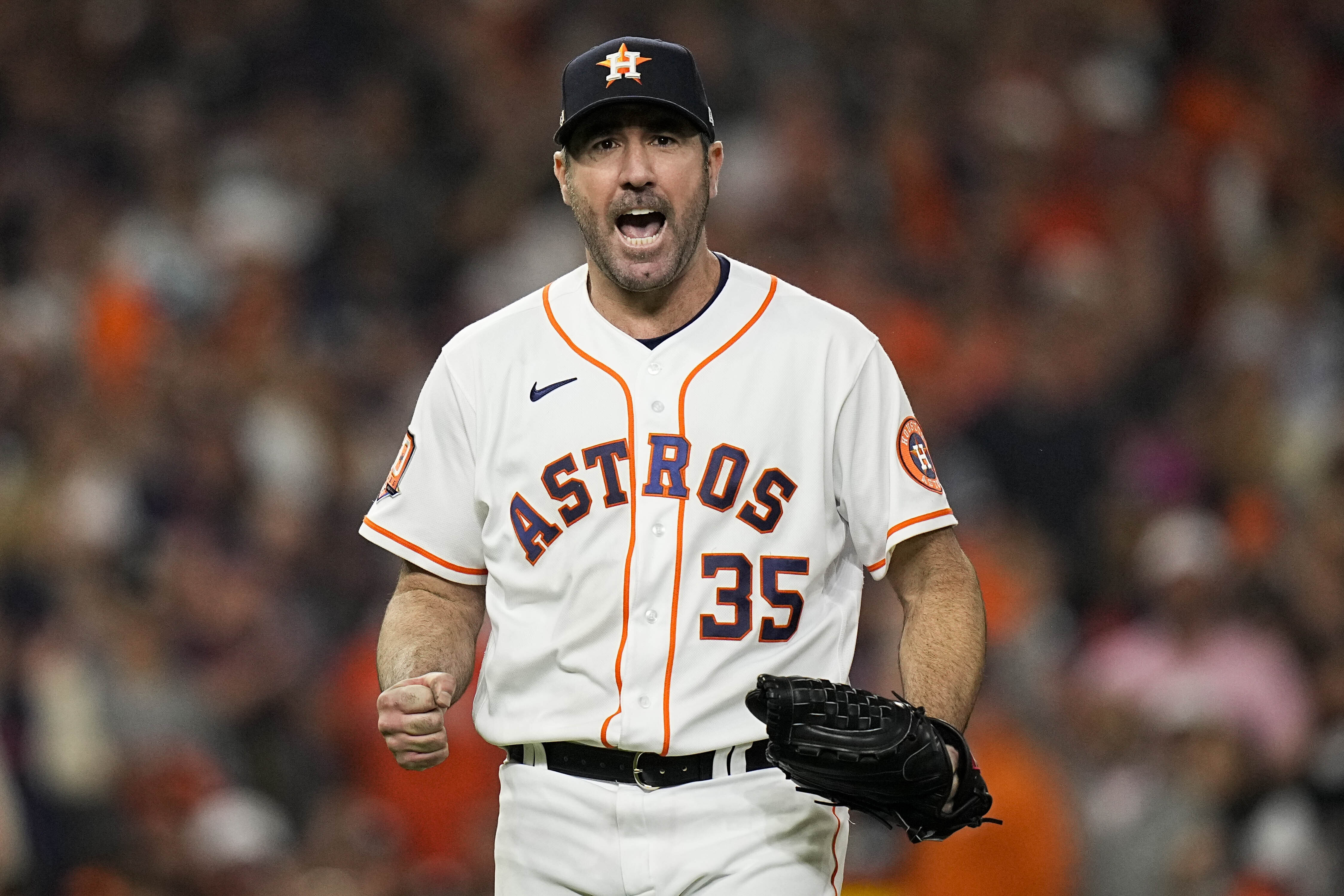 Houston Astros starting pitcher Justin Verlander (35) celebrates the third out during the sixth inning in Game 1 of baseball's American League Championship Series between the Houston Astros and the New York Yankees, Wednesday, Oct. 19, 2022, in Houston. 