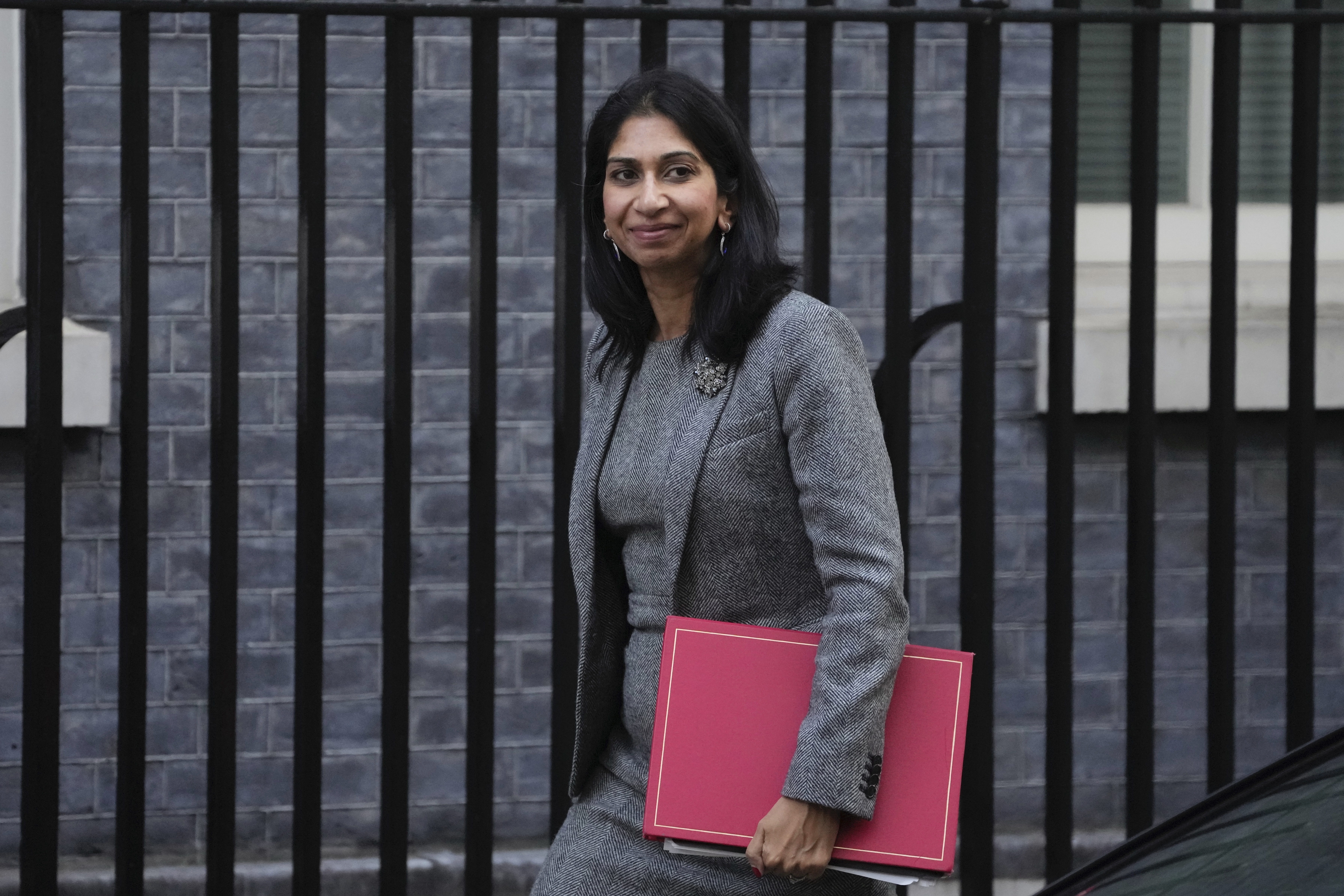 Suella Braverman, Britain's Home Secretary arrives for a cabinet meeting at 10 Downing Street in London, Wednesday. Braverman left her job Wednesday, the second senior minister in a week to leave Prime Minister Liz Truss’ government.