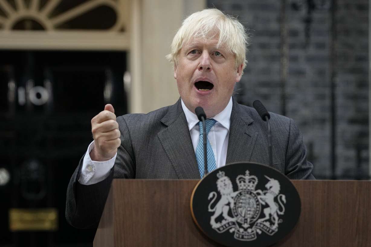 Outgoing British Prime Minister Boris Johnson speaks outside Downing Street in London, Sept. 6. Liz Truss’ resignation as British Prime Minister has triggered another leadership race — the second in just four months — for the U.K.’s fractured and demoralized Conservative Party. There is intense speculation that former Prime Minister Boris Johnson may be making a bid for a return.