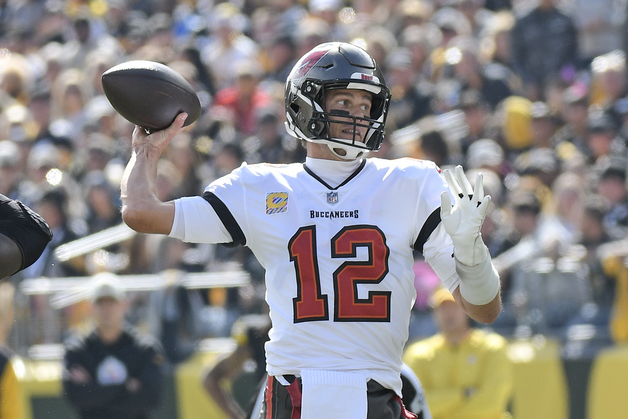 Tampa Bay Buccaneers quarterback Tom Brady (12) throws a pass during the first half of an NFL football game against the Pittsburgh Steelers in Pittsburgh, Sunday, Oct. 16, 2022.