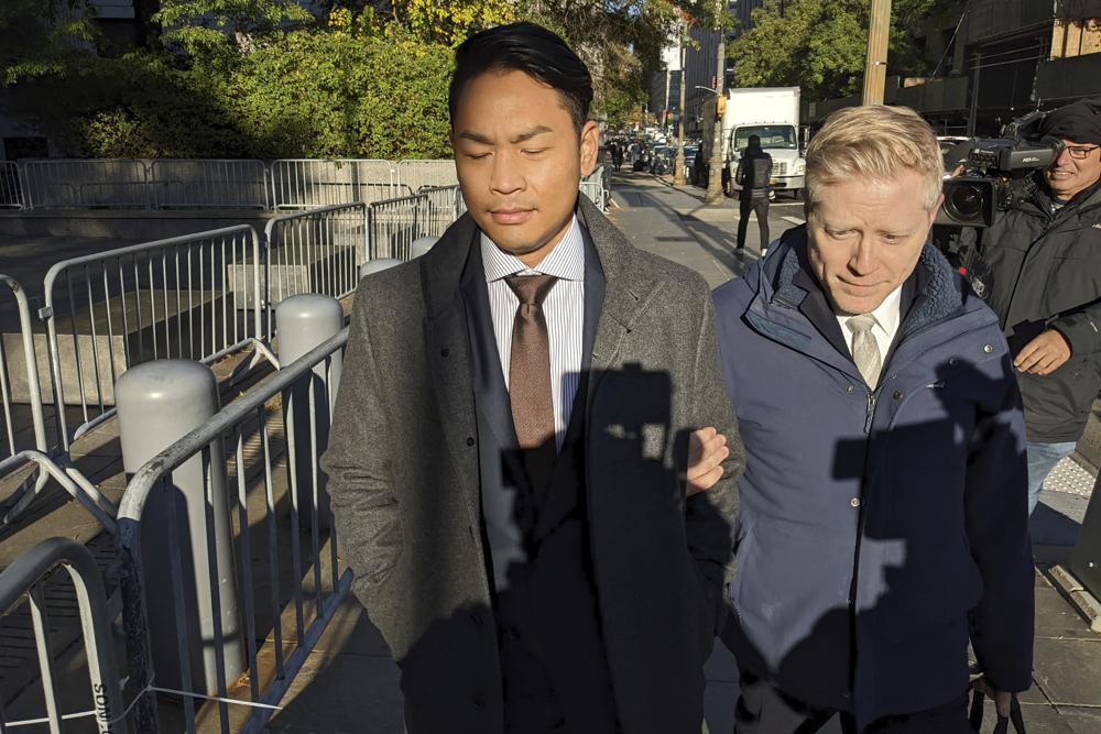 Actor Anthony Rapp, right, and Ken Ithiphol arrive at a federal courthouse in lower Manhattan in New York on Thursday for a civil case against actor Kevin Spacey.