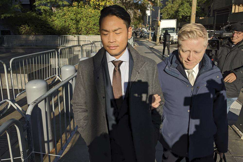 Actor Anthony Rapp, right, and Ken Ithiphol arrive at a federal courthouse in lower Manhattan in New York on Thursday for a civil case against actor Kevin Spacey.