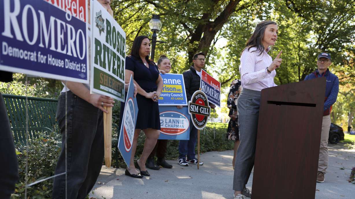 Salt Lake City Mayor Erin Mendenhall, right, and other local elected officials speak about the importance of voting during an event at the Salt Lake City-County Building in Salt Lake City on Thursday.
