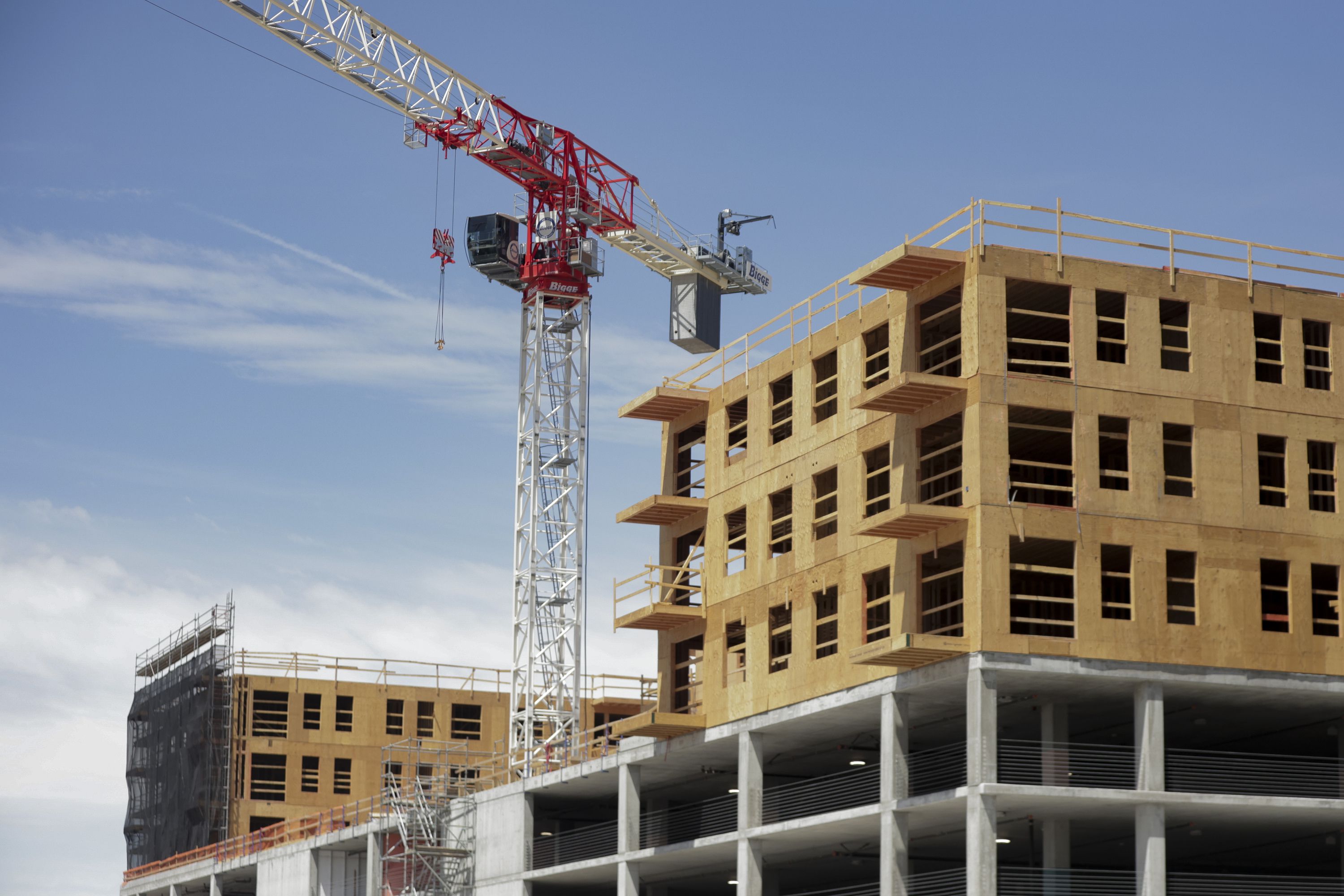 An apartment building under construction in Salt Lake City is pictured on May 16. Home prices are correcting as higher mortgage interest rates clamp down on demand. But that’s not erasing Utah’s housing shortage — and that means Utah’s housing affordability crisis isn’t going anywhere.