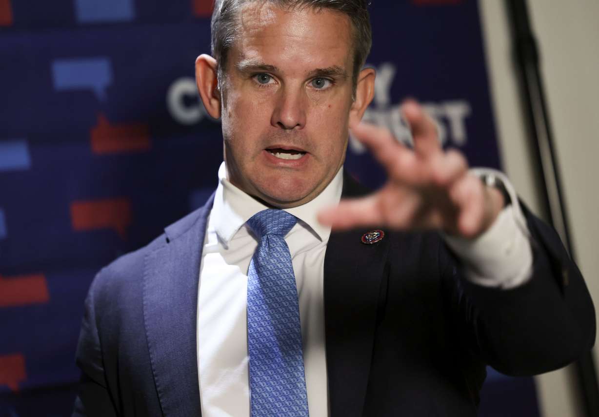 Rep. Adam Kinzinger, R-Ill., a member of U.S. House Jan. 6 Committee, speaks to reporters following a forum on democracy at the Salt Lake City Public Library on Thursday.