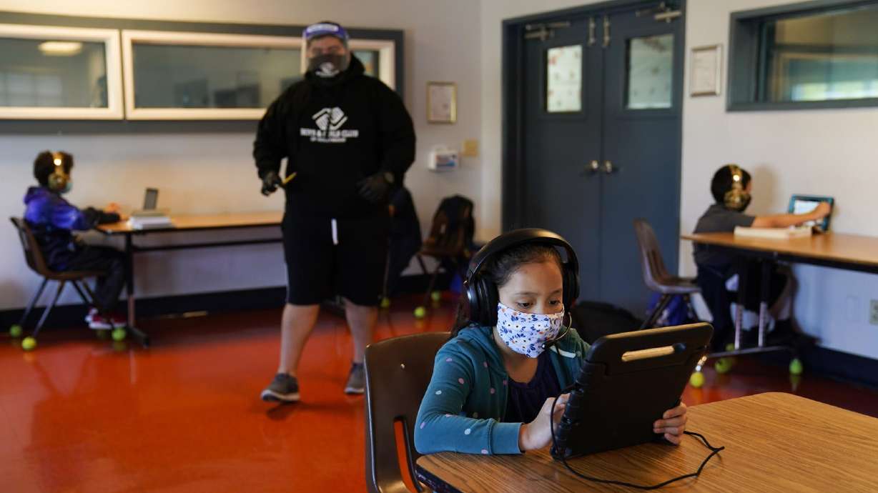 Los Angeles Unified School District students attend online classes at Boys & Girls Club of Hollywood in Los Angeles, Aug. 26, 2020. As the harmful effects of extended pandemic school closures become more apparent, some educators and parents have regrets.