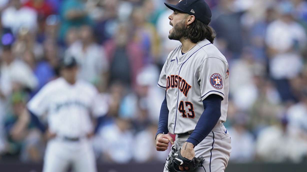 Houston Astros starting pitcher Lance McCullers Jr. (43) reacts after striking out Seattle Mariners catcher Cal Raleigh during the sixth inning in Game 3 of an American League Division Series baseball game Saturday, Oct. 15, 2022, in Seattle.