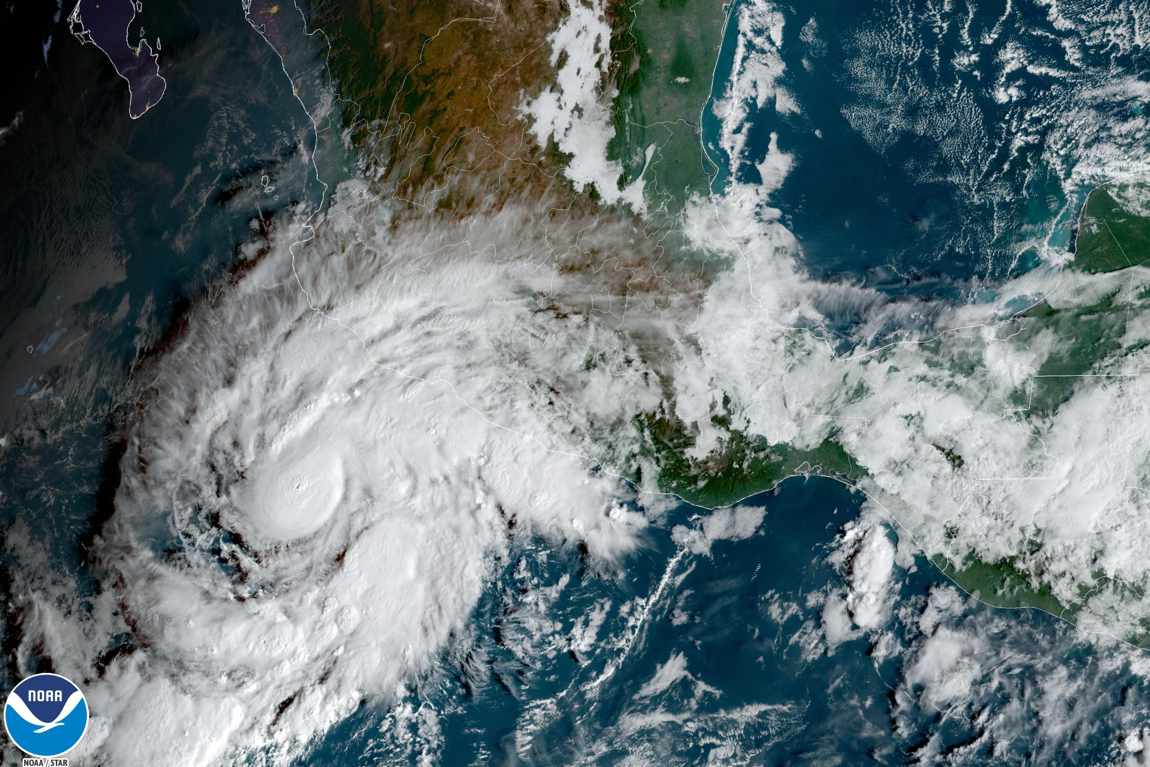 This satellite image taken at 10am ET and provided by NOAA shows Tropical Storm Roslyn approaching the Pacific coast of Mexico, Friday. Forecasters expect it to be a hurricane when it makes a likely weekend landfall between the resorts of Puerto Vallarta and Mazatlan. 