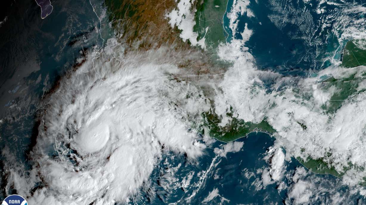 This satellite image taken at 10am ET and provided by NOAA shows Tropical Storm Roslyn approaching the Pacific coast of Mexico, Friday. Forecasters expect it to be a hurricane when it makes a likely weekend landfall between the resorts of Puerto Vallarta and Mazatlan.