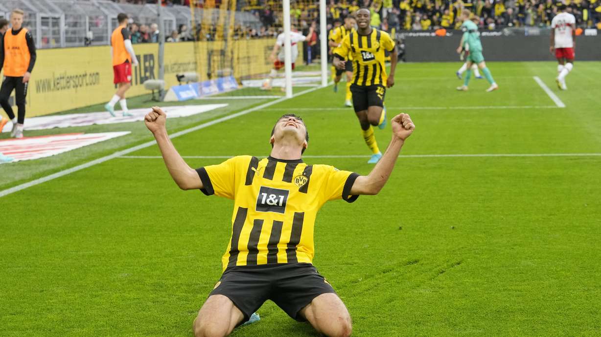 Dortmund's Giovanni Reyna celebrates after scoring his side's third goal during the German Bundesliga soccer match between Borussia Dortmund and VfB Stuttgart in Dortmund, Germany, Saturday, Oct. 22, 2022.