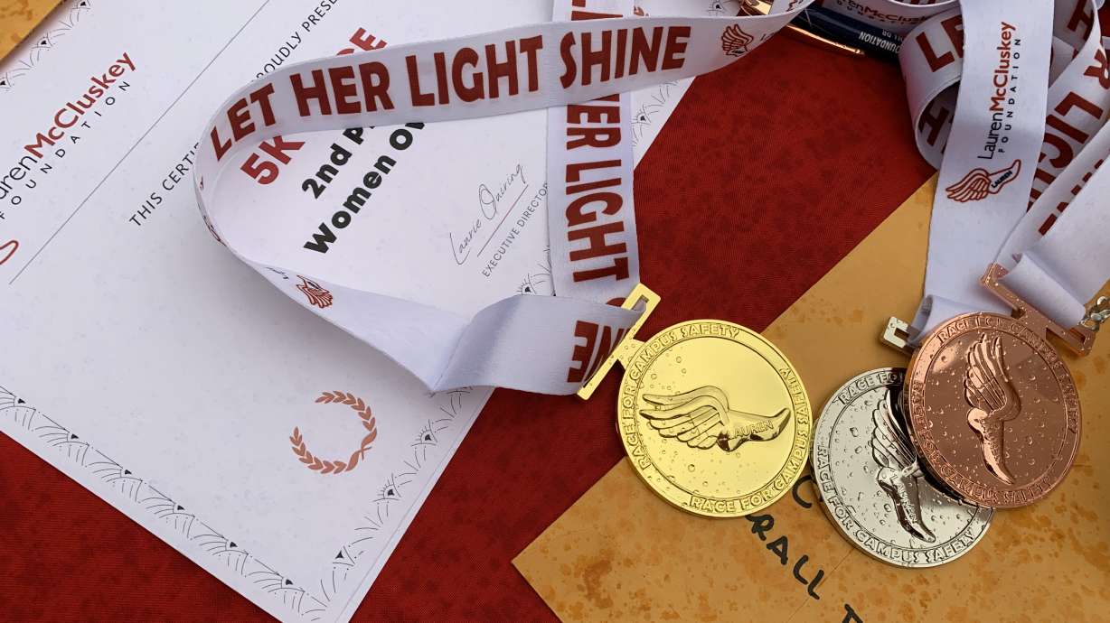 Medals for the first Utah Race for Campus Safety at the University of Utah campus on Saturday. The race is in memory of Lauren McCluskey who was killed by her ex-boyfriend on Oct. 22, 2018, and is held by the Lauren McCluskey Foundation which is working to promote campus safety.