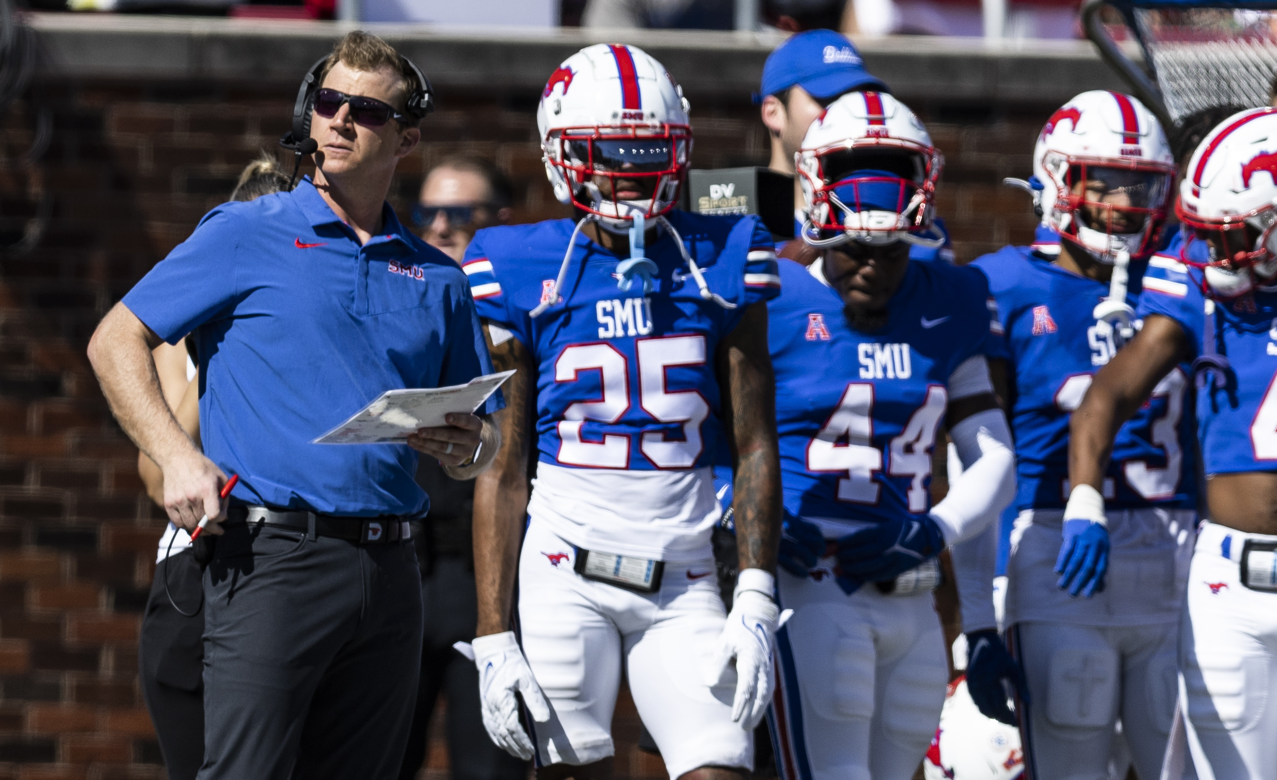 SMU head coach Rhett Lashlee looks on from the sidelines during the first half of an NCAA college football game against Cincinnati, Saturday, Oct. 22, 2022, in Dallas.