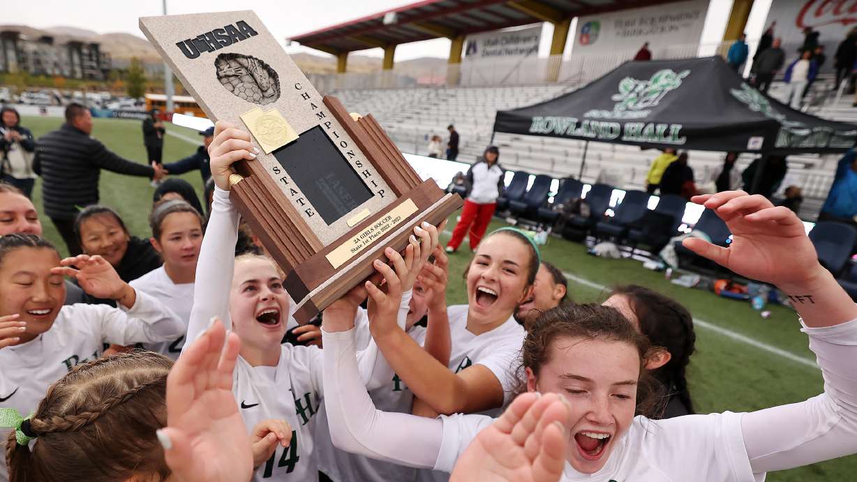 Rowland Hall player celebrate their win over St. Joseph in the 2A state championship at Zions Bank Stadium in Herriman on Saturday, Oct. 22, 2022.