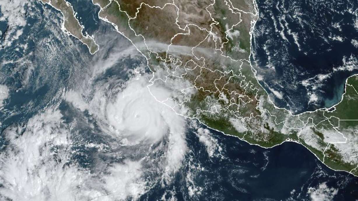 This satellite image taken at 15:30 UTC and provided by the National Oceanic and Atmospheric Administration shows Hurricane Roslyn approaching the Pacific coast of Mexico, Saturday. Roslyn grew to Category 4 force on Saturday as it headed for a collision with Mexico’s Pacific coast, likely north of the resort of Puerto Vallarta.