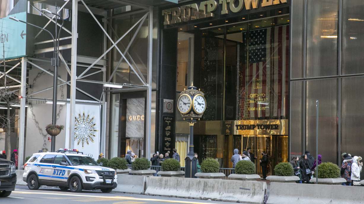 Trump Tower is visible in New York City on Feb. 20. Former President Donald Trump's company is set to face trial on charges that it helped some of its executives cheat on their taxes. Jury selection is scheduled to begin Monday in New York City.