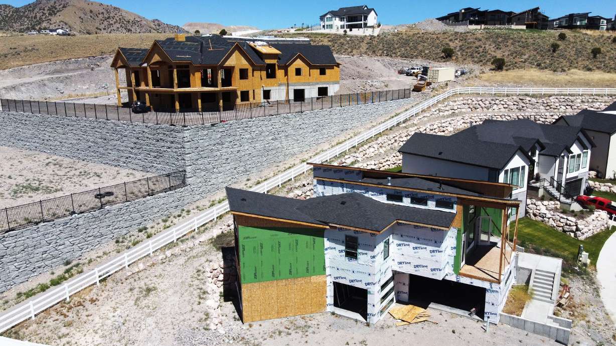 Homes under construction in Herriman are pictured on July 5. The U.S. housing market's rapid correction hasn't erased all the home price gains seen during the pandemic housing frenzy over the last two years, but August saw prices slow at the fastest pace on record.