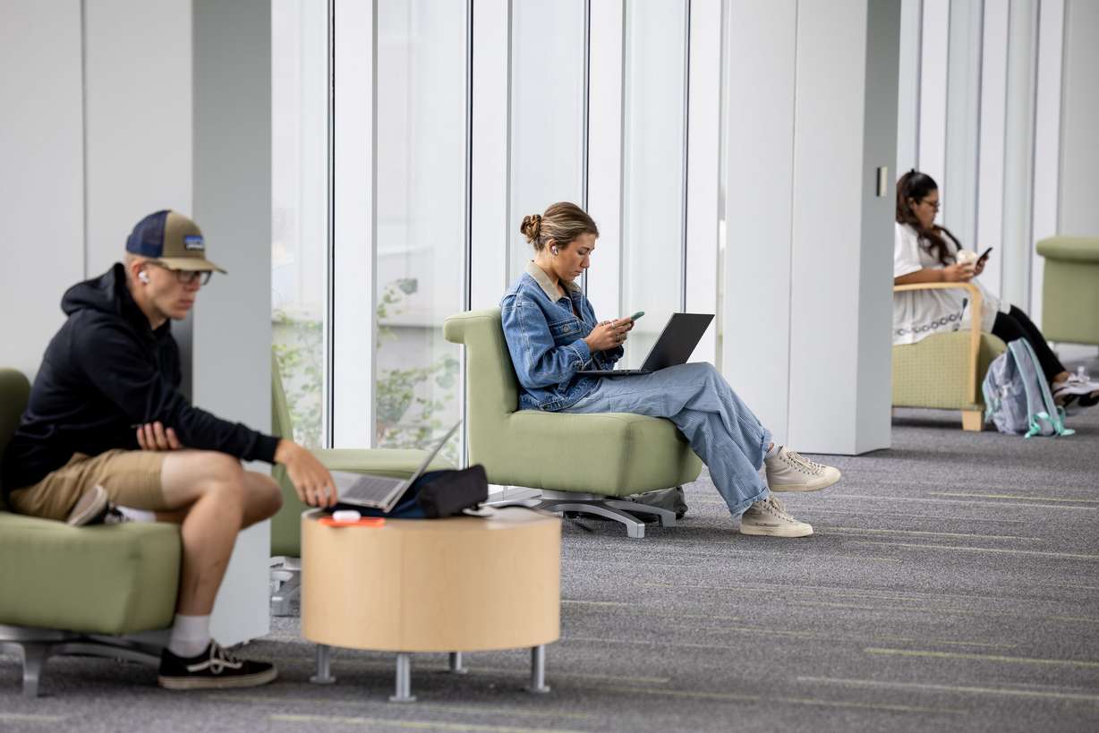 Students work in a common space at Utah Valley University in Orem on Sept. 15.