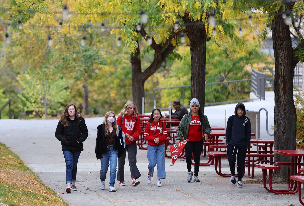 University of Utah students walk on campus in Salt Lake City on Tuesday. Utah Gov. Spencer Cox is talking about an across-the-board tuition freeze.
