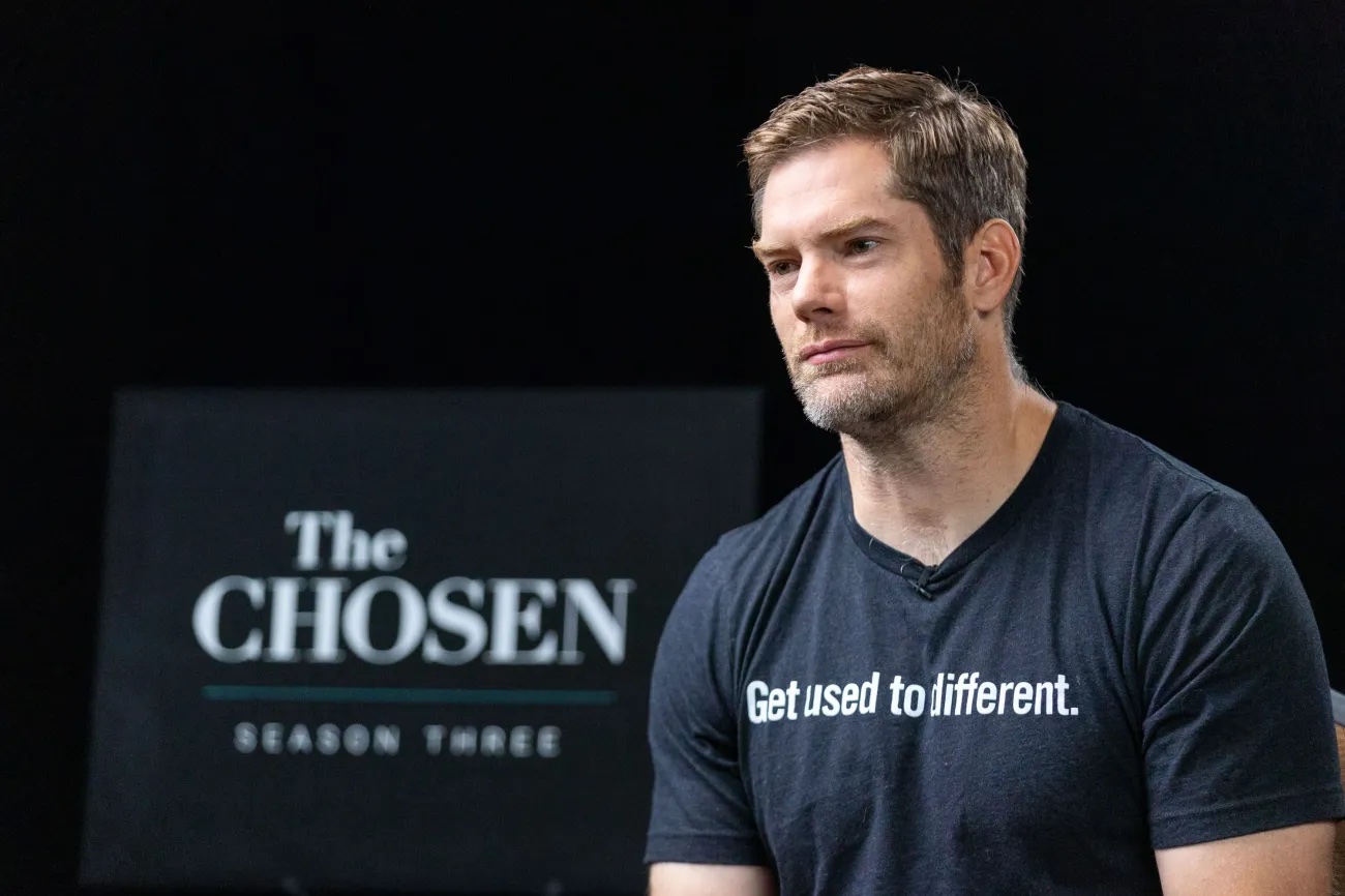 Dallas Jenkin, creator, producer, writer and director of “The Chosen,” speaks at the Salvation Army’s Camp Hoblitzelle in Midlothian, Texas, on Monday, Aug. 15. Jenkins has denied recent claims that he used a line from the Book of Mormon in Season 3.