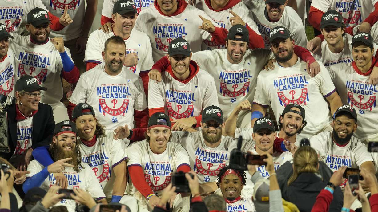 Philadelphia Phillies celebrate after winning the baseball NL Championship Series in Game 5 against the San Diego Padres on Sunday, Oct. 23, 2022, in Philadelphia.
