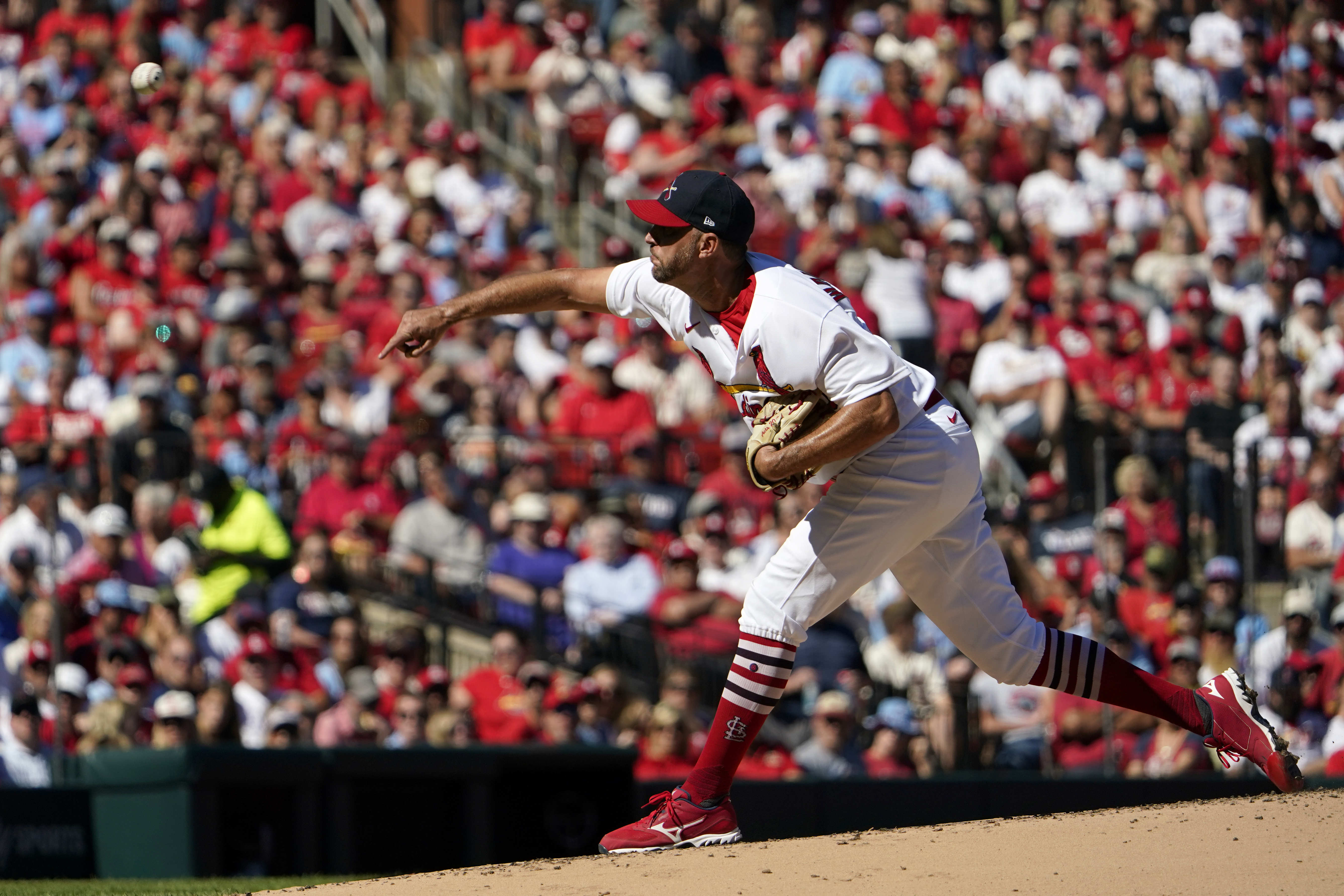 St. Louis Cardinals starting pitcher Adam Wainwright throws during the second inning of a baseball game against the Pittsburgh Pirates Sunday, Oct. 2, 2022, in St. Louis.