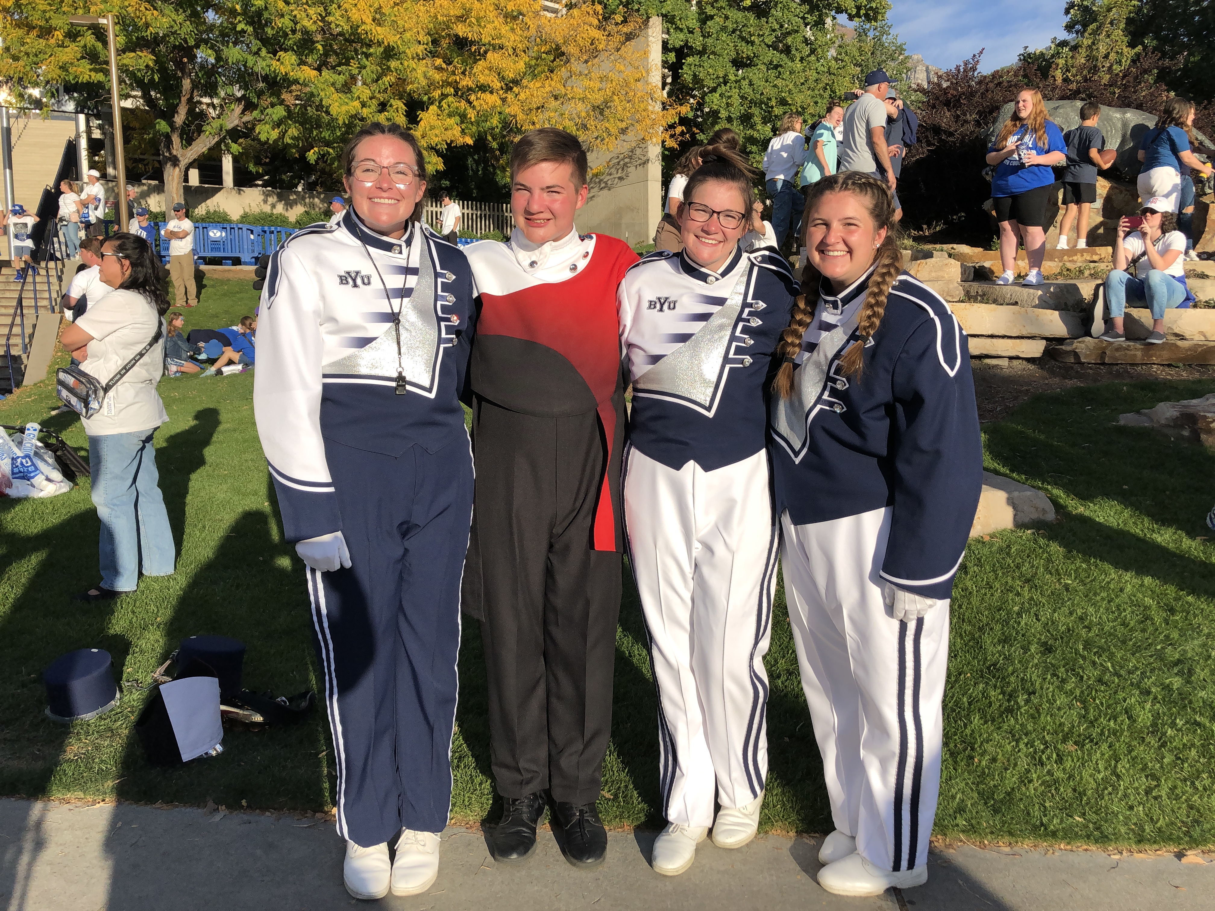 Emily, Reid, Sarah and Megan Rogers pose for a picture following the BYU Football game on Oct. 22. They are each members of the marching band at their respective schools, including BYU and American Fork High School.